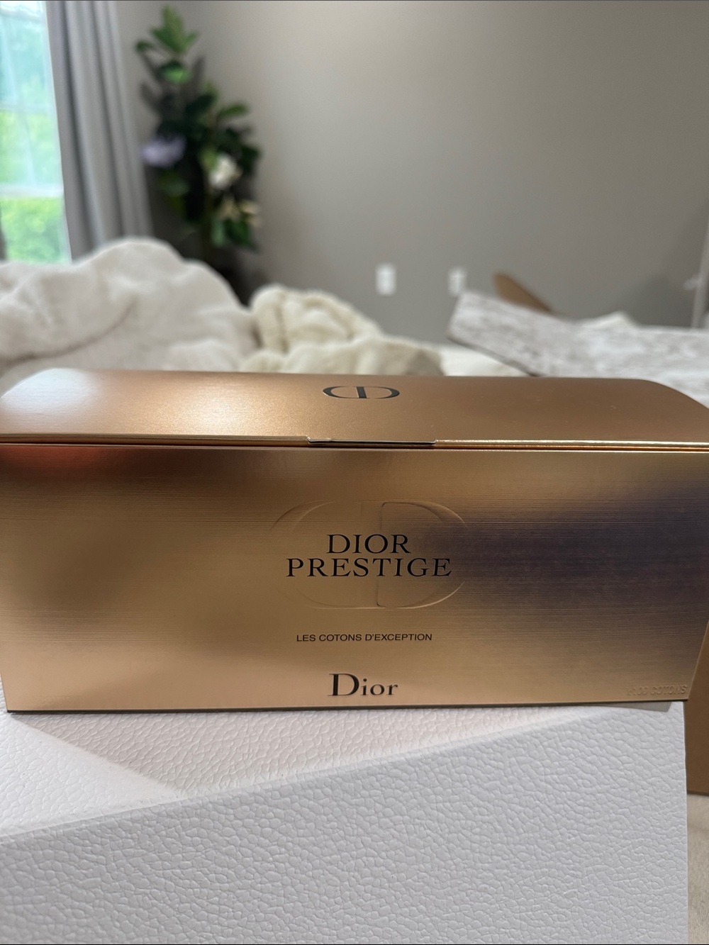 Dior Prestige Metallic Gold Luxury Skincare Box with facial cloths.